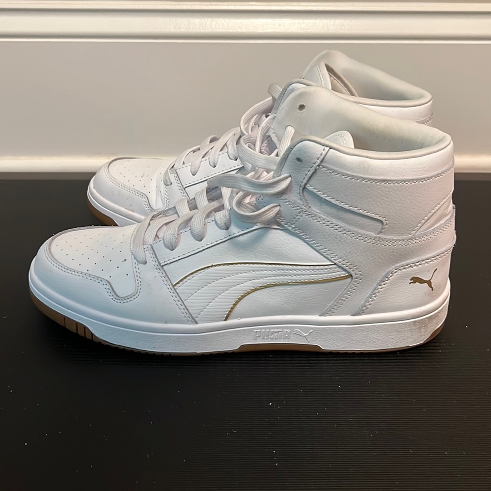 White high top women’s Puma sneakers